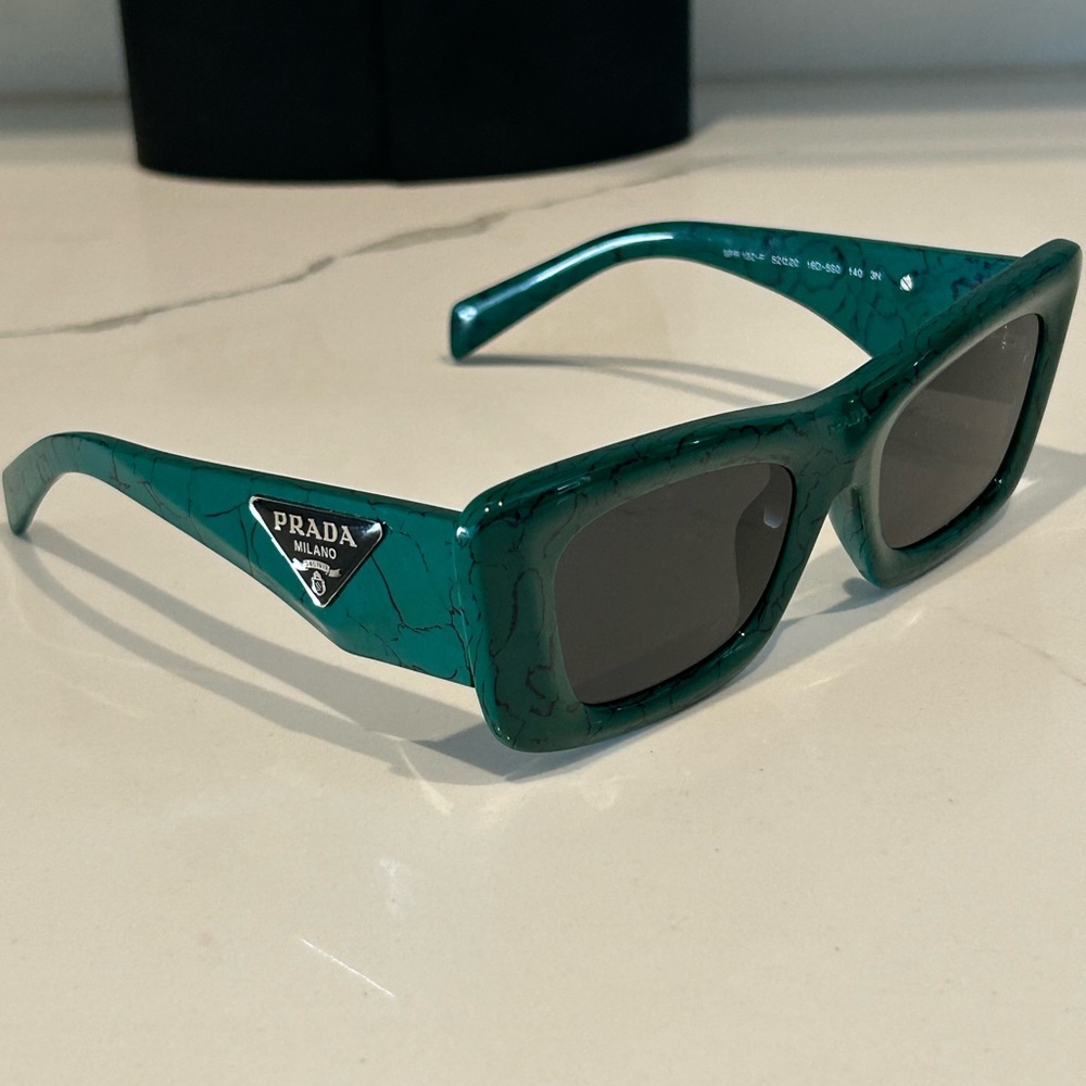 Prada Teal Rectangular Sunglasses The Prada PR 13ZS